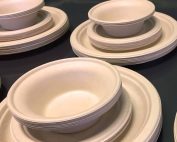 Molded fiber plates and bowls stacked together
